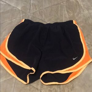 purple and orange nike shorts